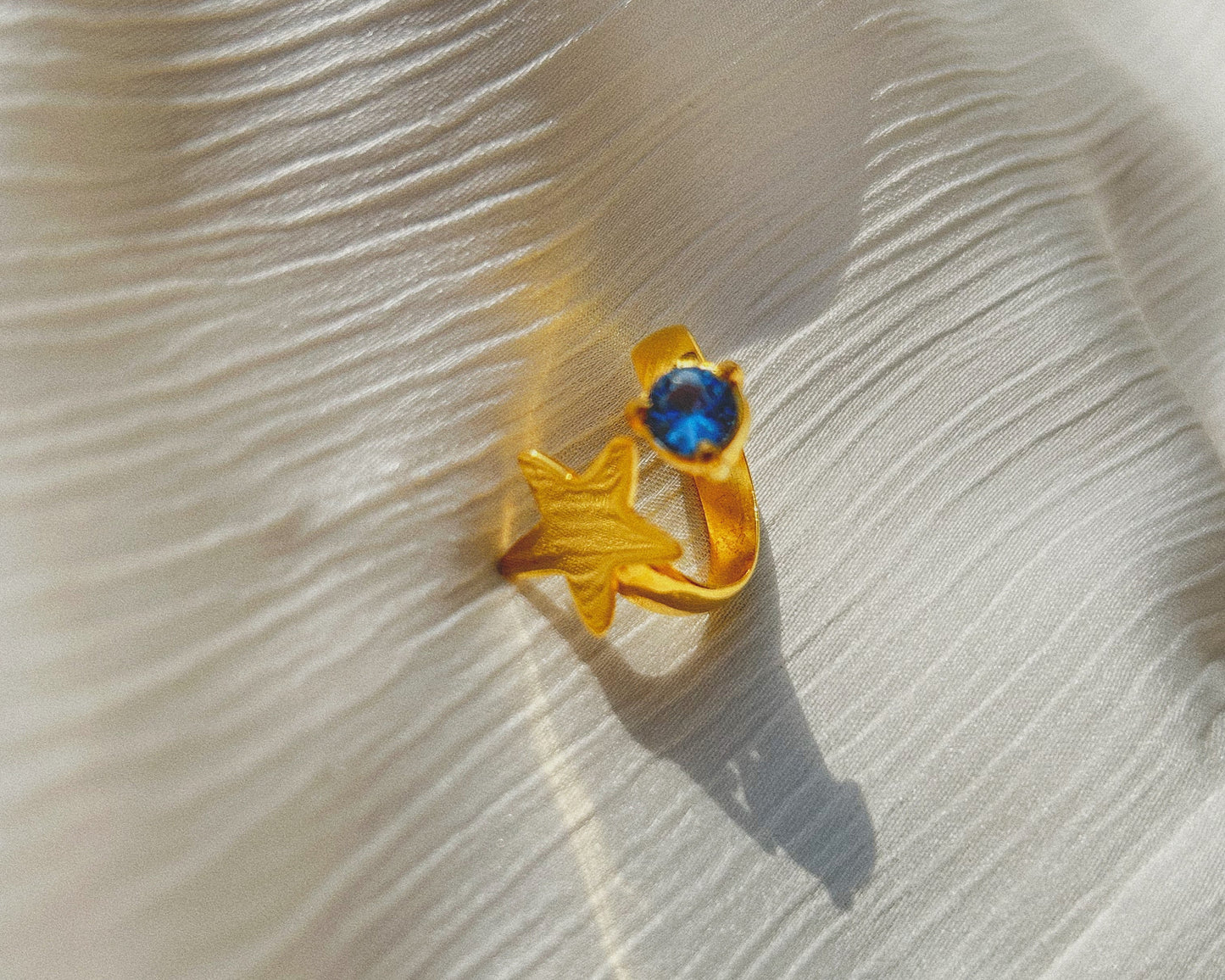 Starry Glow Ring in Blue Topaz