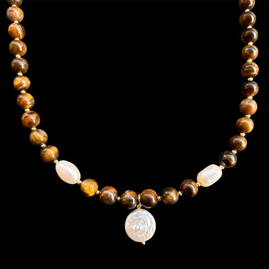 Natural Tiger’s Eye & Freshwater Pearls

Energy: Protection