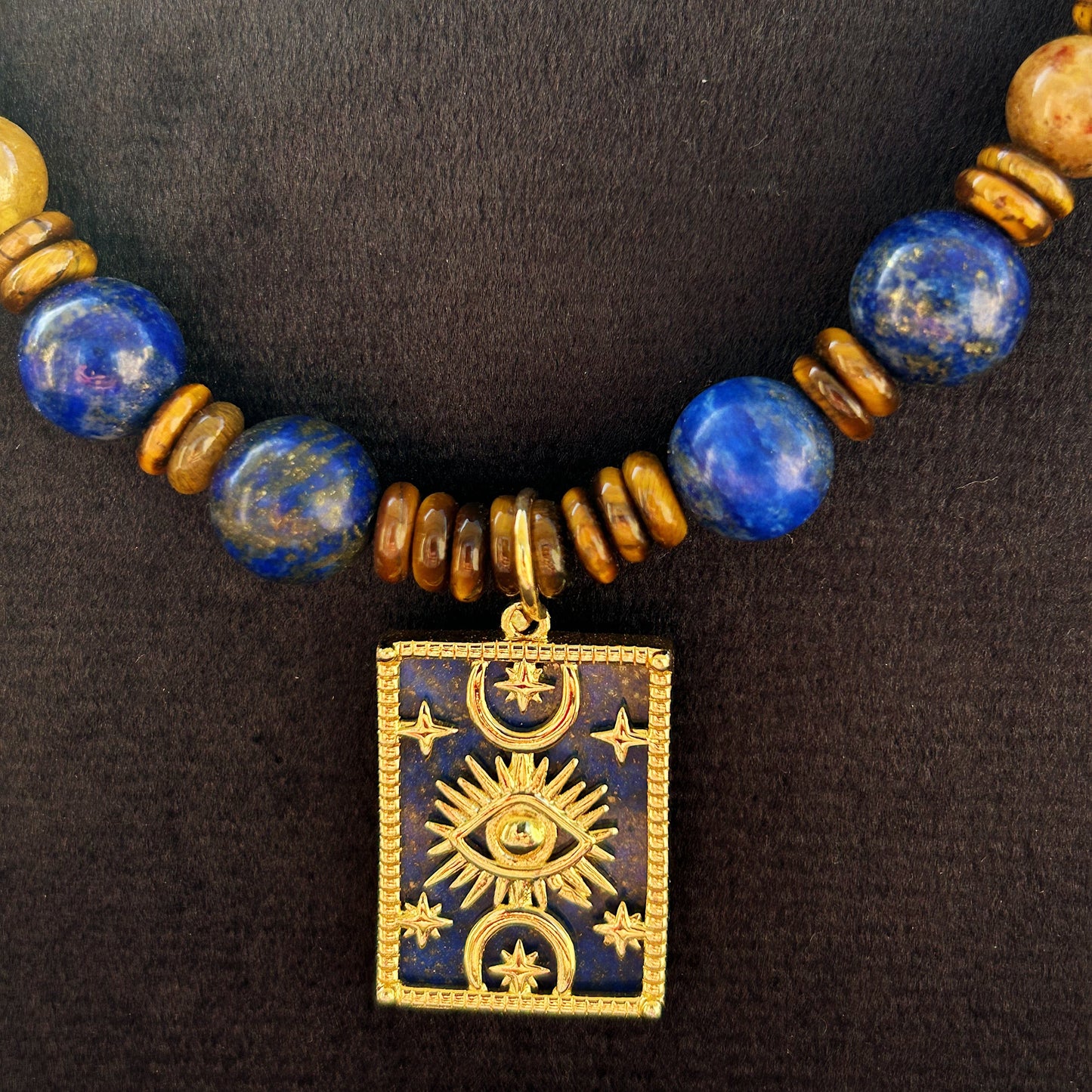 Midnight Oracle Necklace in natural Lapis lazuli, Peridot, and Tiger Eye, finished with a unique double-face pendant