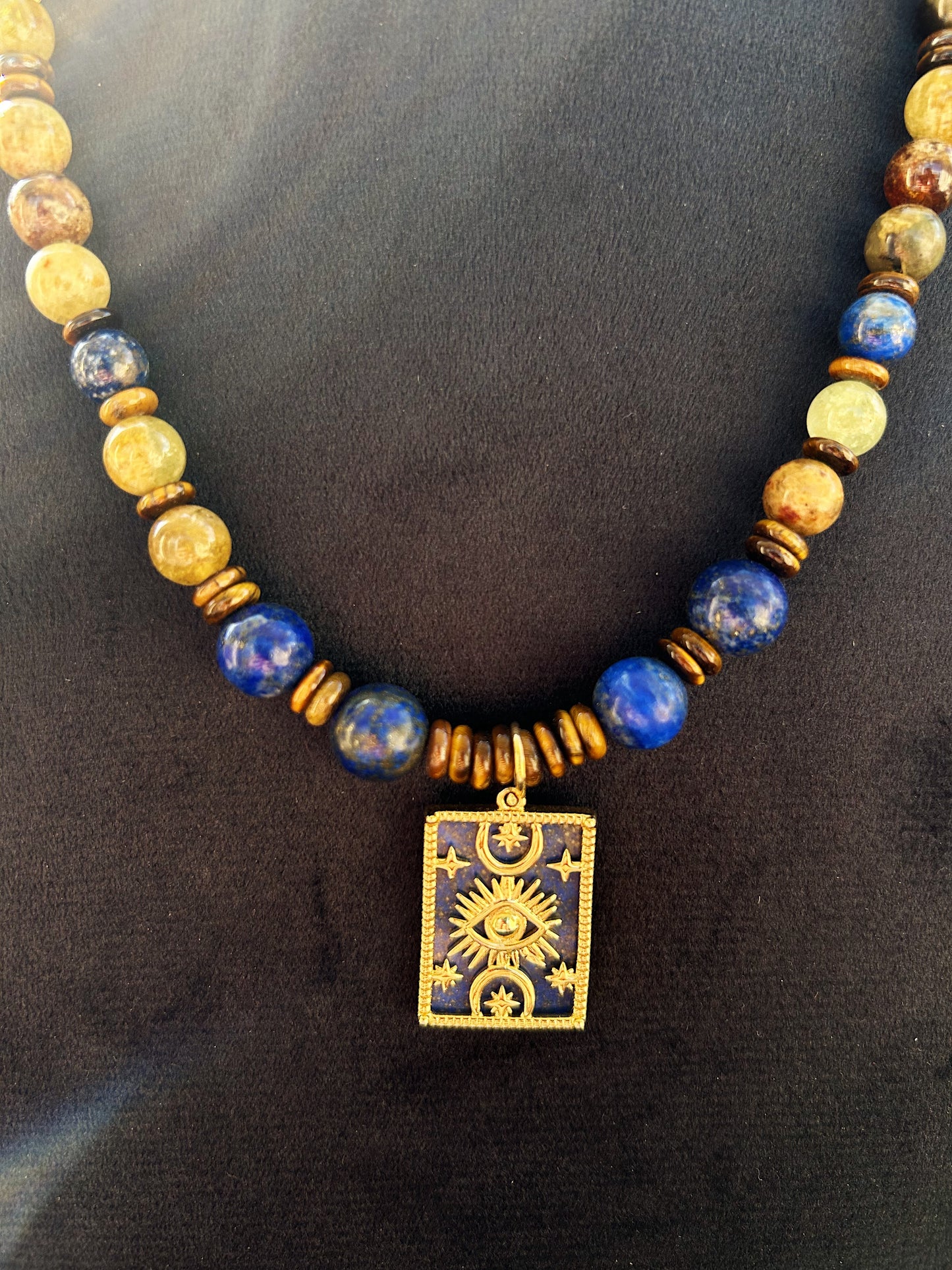 Midnight Oracle Necklace in natural Lapis lazuli, Peridot, and Tiger Eye, finished with a unique double-face pendant