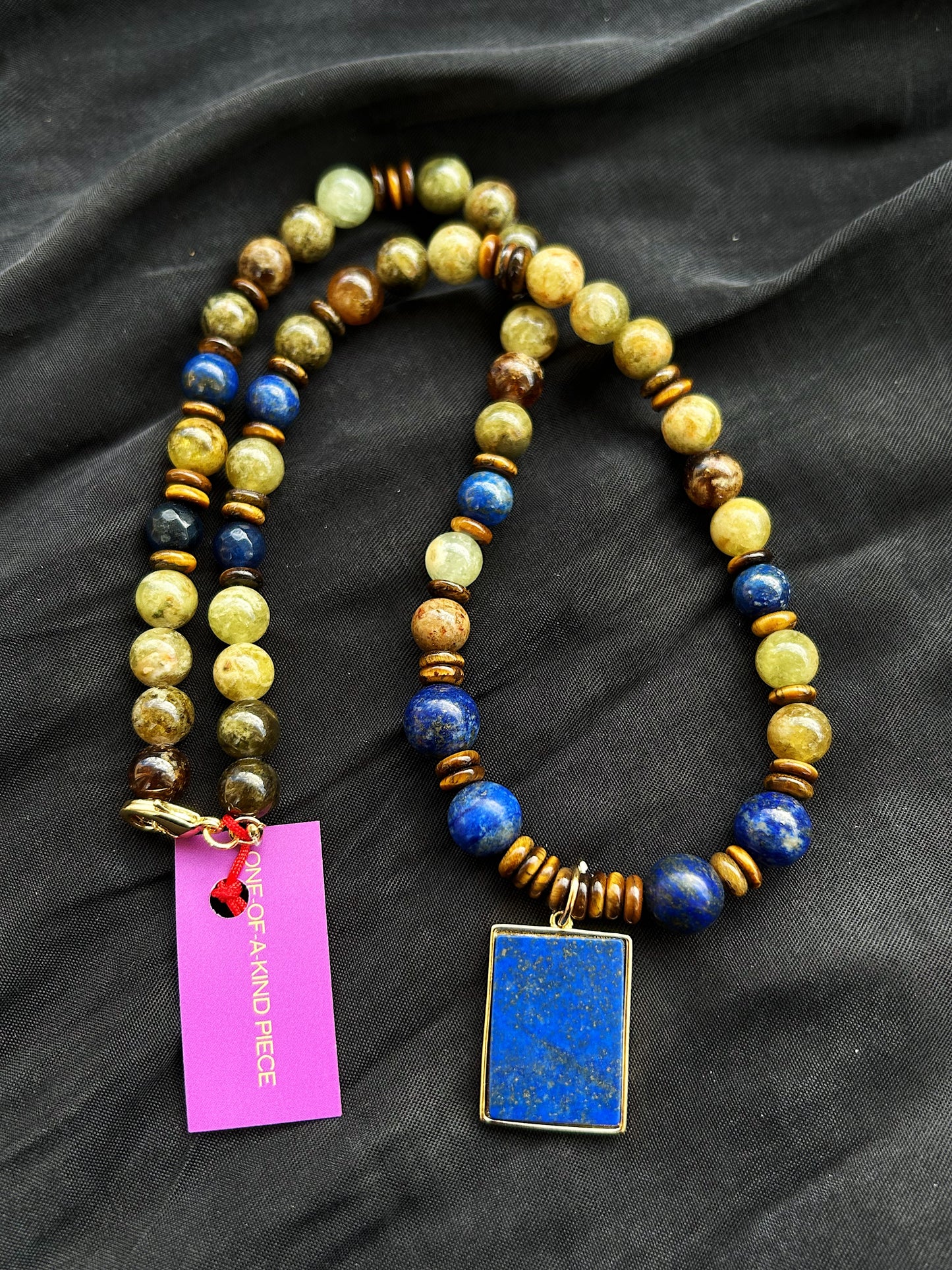 Midnight Oracle Necklace in natural Lapis lazuli, Peridot, and Tiger Eye, finished with a unique double-face pendant